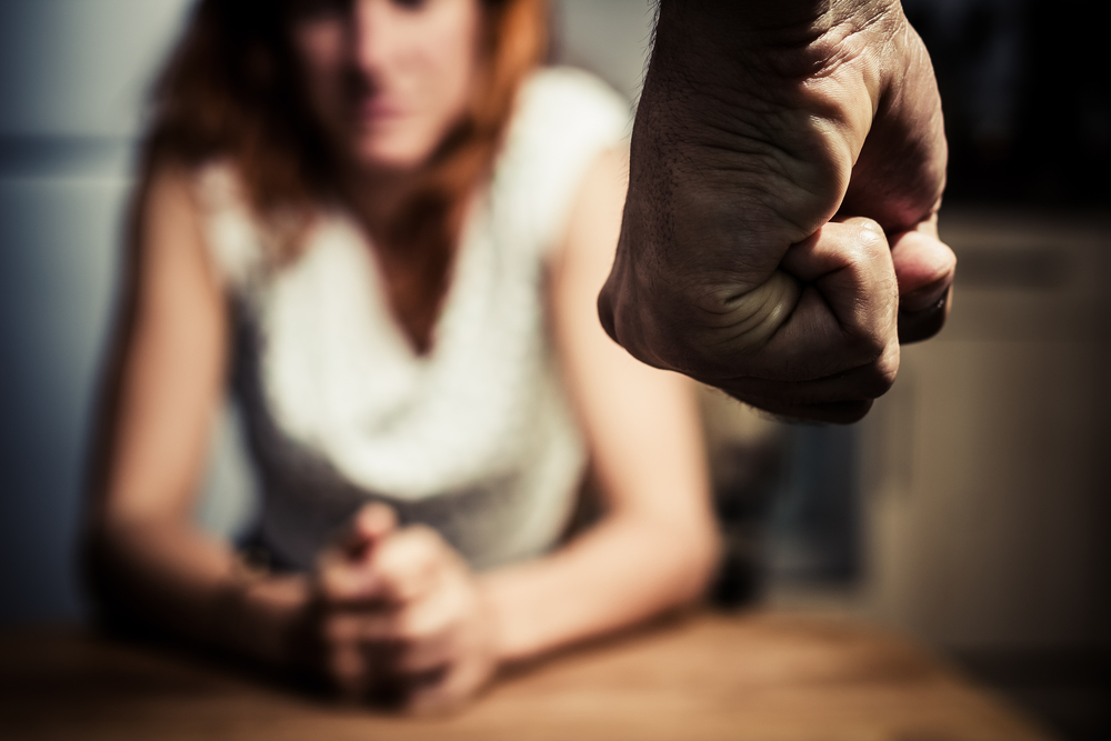 Bail Bonds for Domestic Violence in Fullerton, picture of woman and man clinched fist